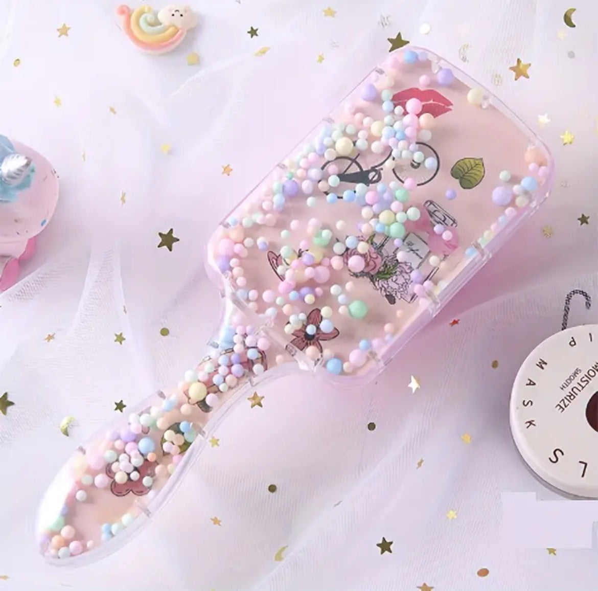 مشط تدليك فروة الرأس على شكل وسادة هوائية بنمط كرتوني