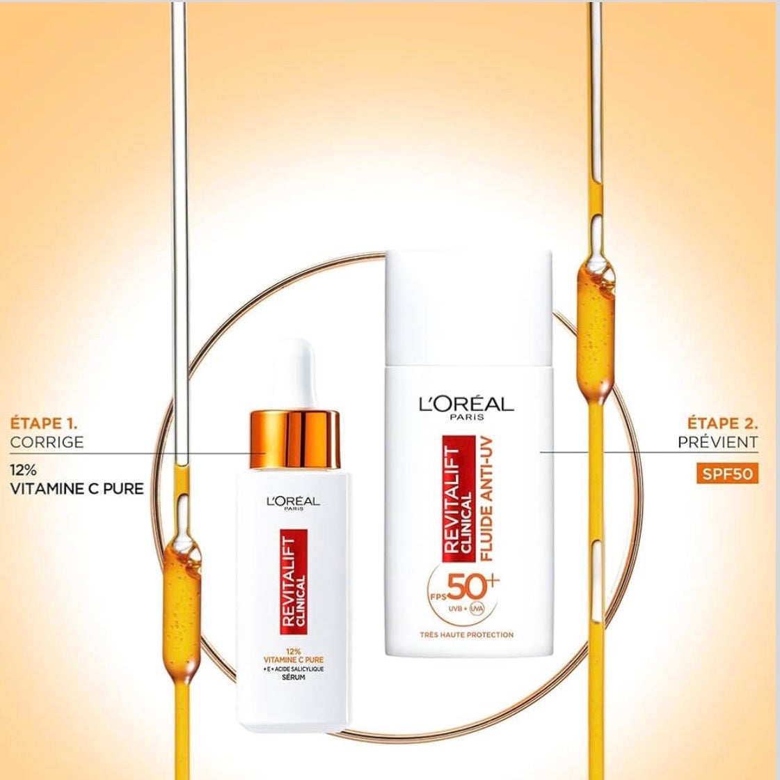 سائل لوريال باريس المضاد للأشعة فوق البنفسجية بعامل حماية من الشمس 50+، فيتامين سي + فيتامين إي + حمض الهيالورونيك، للبقع الداكنة والتجاعيد ولون البشرة غير الموحد، لمسة نهائية غير مرئية