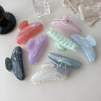 مشبك شعر رخامي للنساء بألوان الباستيل مع أنماط النجوم والأمواج