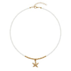 Collier De Perles Blanches Orné D'une Étoile De Mer Dorée