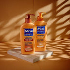 حليب الجسم المغذي المكثف من ميكسا مع زيت المشمش وزبدة الشيا لتأثير الشمس على البشرة الداكنة